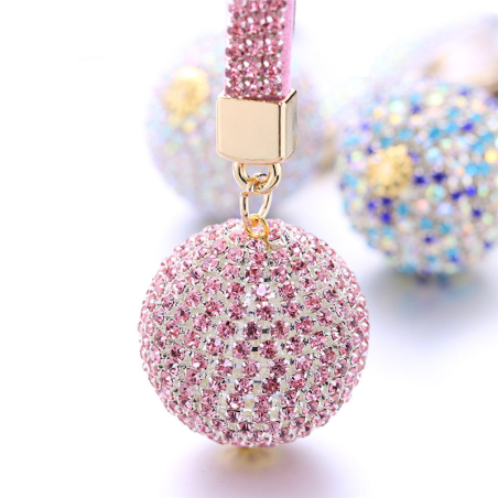 Porte-clés rose avec boule et strass