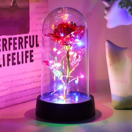 Eternal rose in pink in a glass with LED light chain